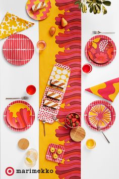 Marimekko plates, bowls, cups, and napkins.