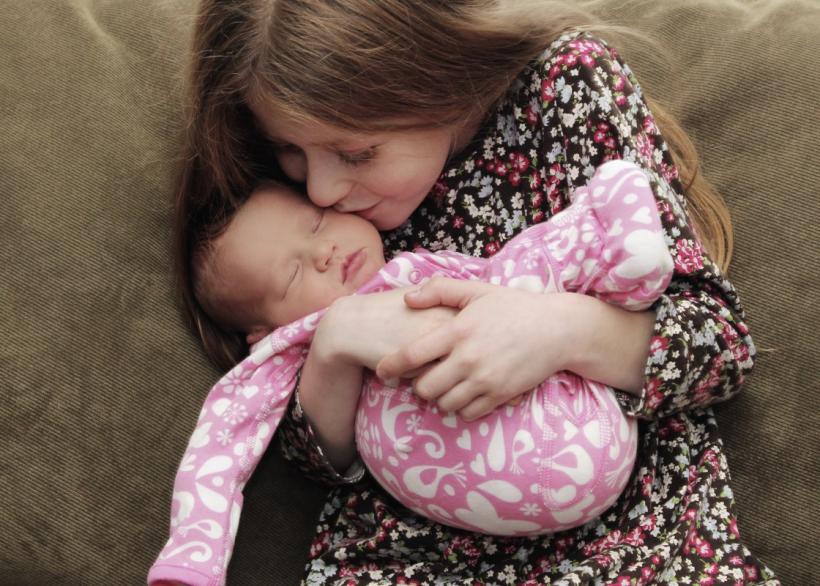 My oldest holding our surprise (photo: Allison Dickie)