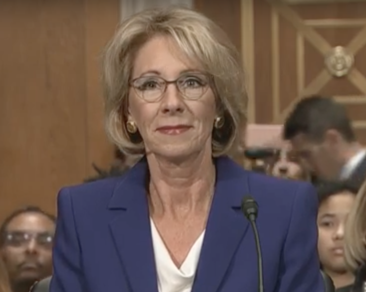 No experience working in public schools. What could go wrong? (Image Credit: YouTube / PBS Newshour) No experience working in public schools. What could go wrong? (Image Credit: YouTube / PBS Newshour)