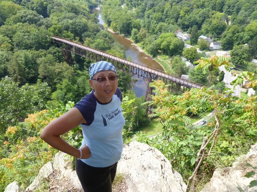 Atop Joppenbergh Mountain in New York, channeling Rosie the Riveter's fierceness