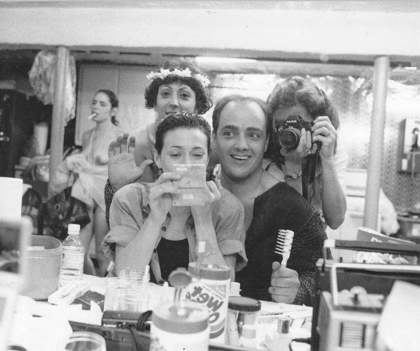 Michelle (with cigarette), the author, the makeup artist, Barbara Nitke (with camera), and actor Damien Cashmere, as shot in a makeup mirror, behind the scenes at Every Body (Photo courtesy of Barbara Nitke)