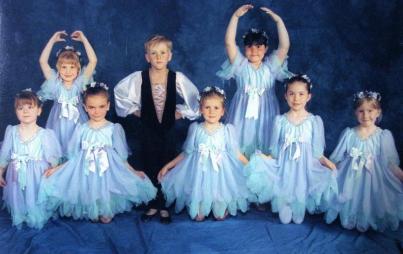Writer at six years old, photographed at a local ballet school